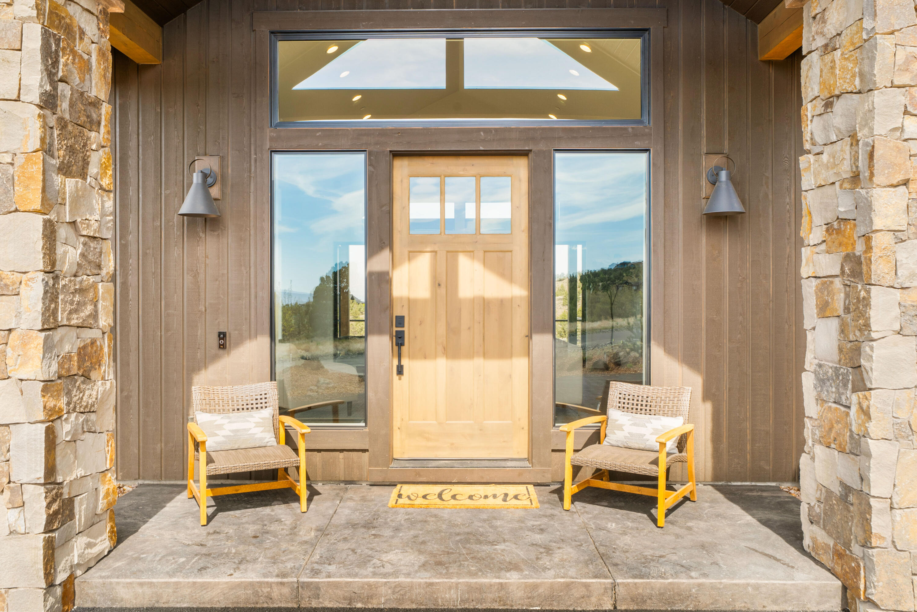16883 Southwest Paragon Court Powell Butte, OR 97753 - Photo 2 of 42 Welcoming covered front patio. Windows to great room