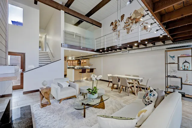 a view of a living room with furniture