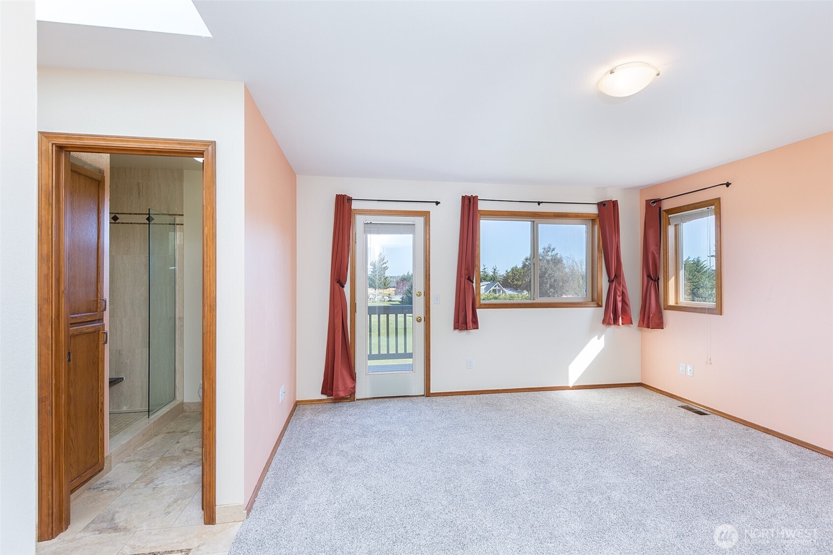 81 Bon Jon View Way Sequim, WA 98382 - Photo 24 of 38 a view of a big room with windows and chandelier