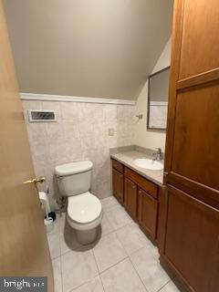 220 Ryers Avenue Cheltenham, PA 19012 - Photo 17 of 19 a bathroom with a granite countertop toilet and a sink