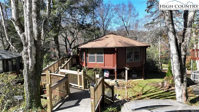 an aerial view of a house with a trees