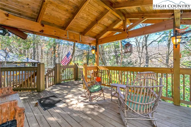 a view of porch with a bench