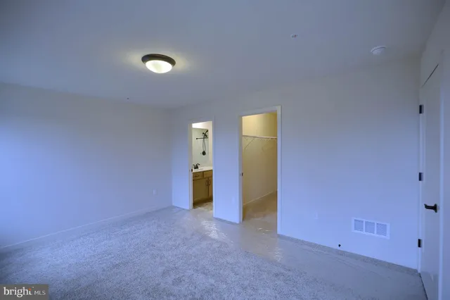 an empty room with a door