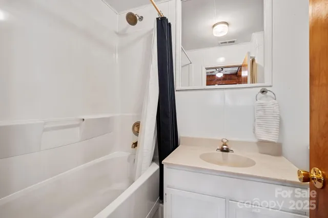 a bathroom with a sink and a bathtub