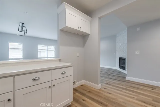 a view of a kitchen with cabinets