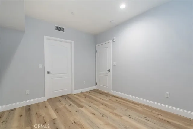 a view of an empty walk in closet