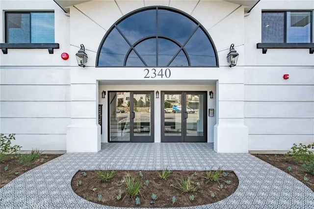 a view of entrance gate of a house