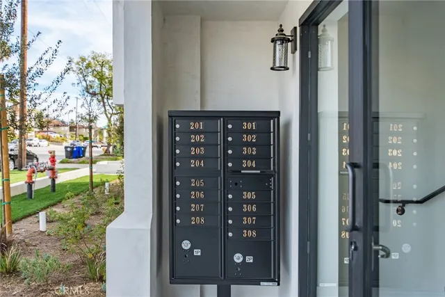 a view of a wooden door with a tree