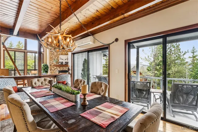 a bathroom with a granite countertop toilet sink and mirror