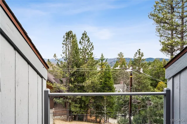 a bathroom with a double vanity sink mirror and shower