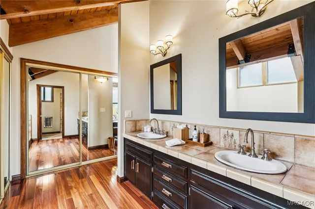a view of front door with wooden floor