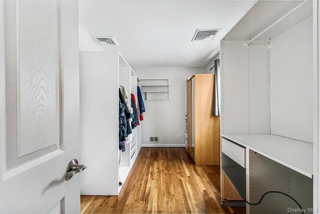 a view of entryway with wooden floor