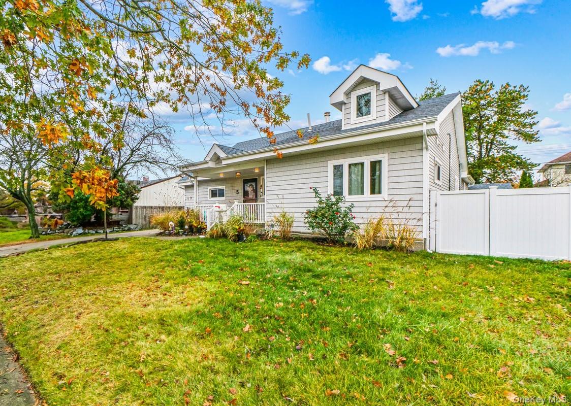 5 Terry Lane Plainview, NY 11803 - Photo 26 of 29 a view of a house with a backyard