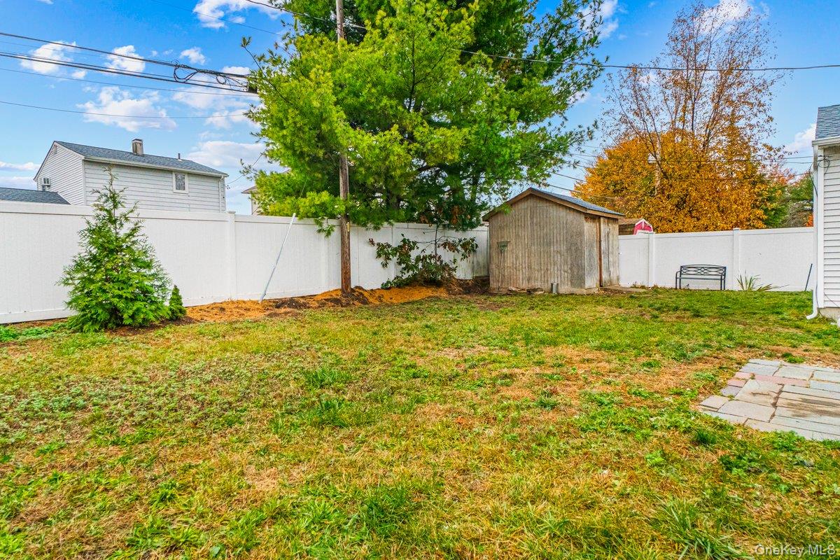 5 Terry Lane Plainview, NY 11803 - Photo 27 of 29 a view of a back yard of the house