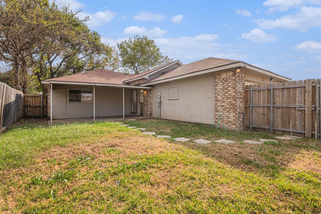 1105 Irene Drive Mesquite, TX 75149 - Photo 23 of 23 a front view of house with yard and trees