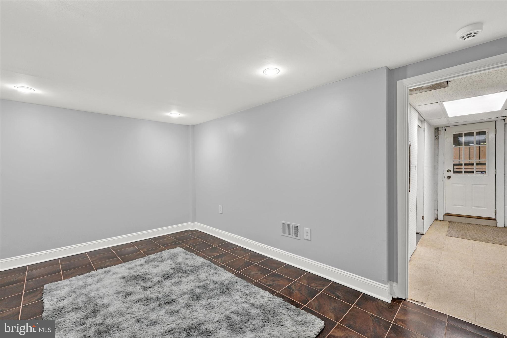 1203 Walker Avenue Baltimore, MD 21239 - Photo 19 of 31 wooden floor in a room