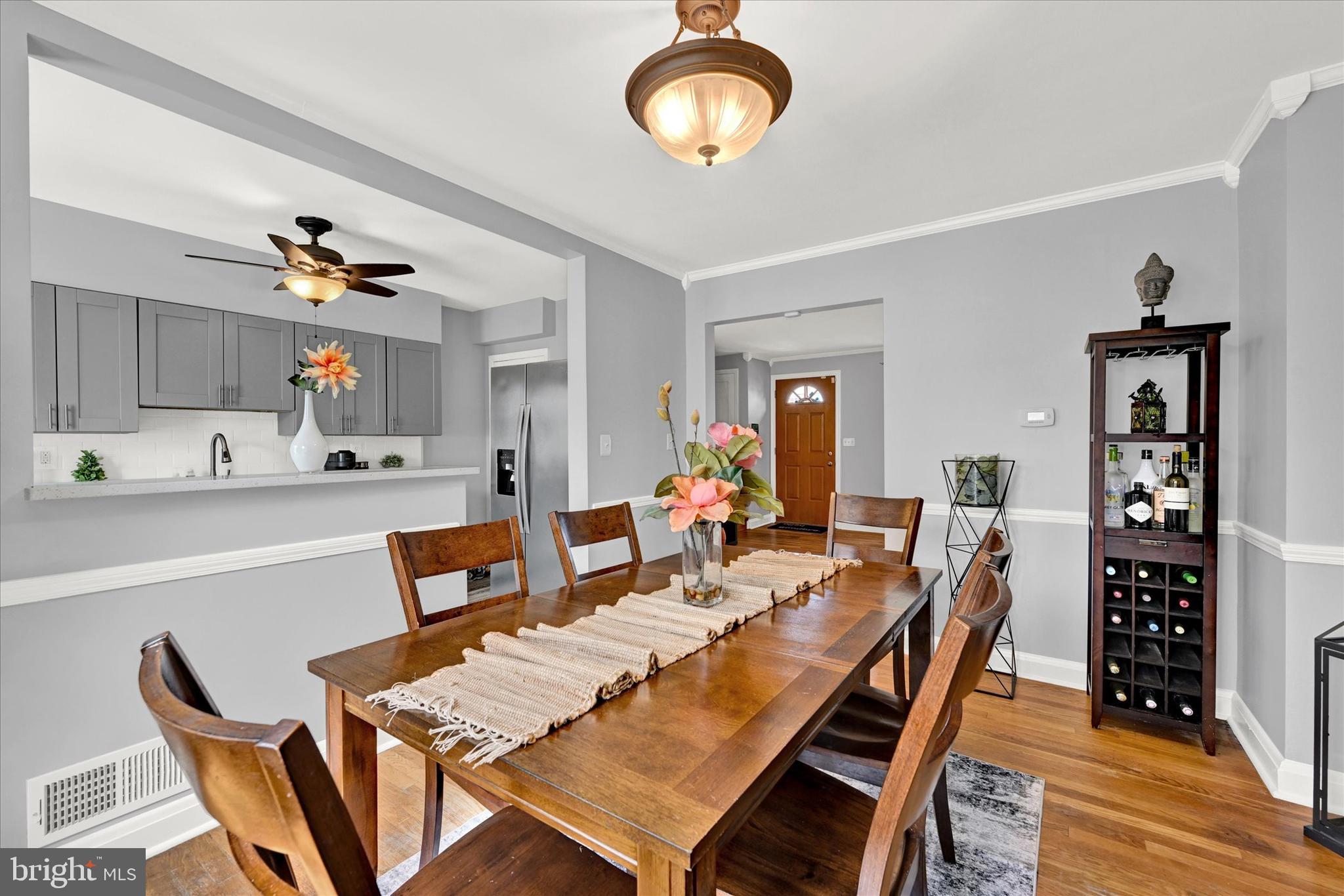 1203 Walker Avenue Baltimore, MD 21239 - Photo 5 of 31 a view of a dining room with furniture