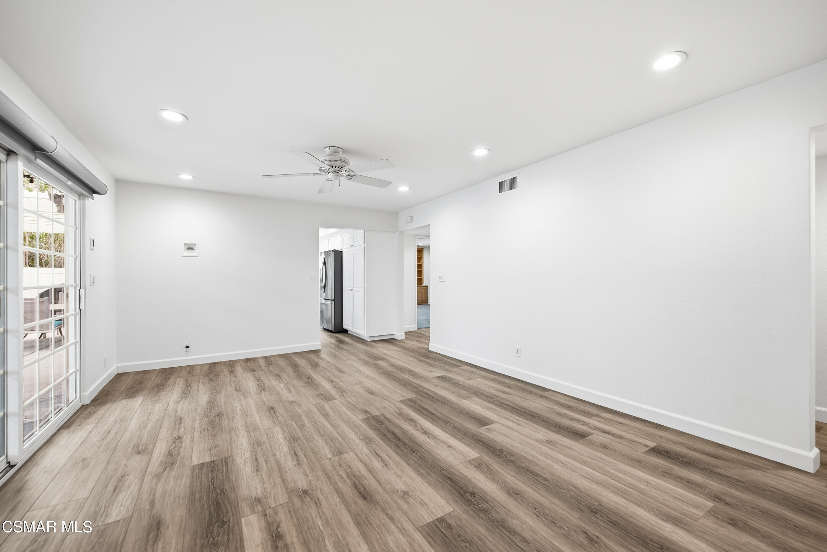 3598 Scofield Avenue Simi Valley, CA 93063 - Photo 27 of 86 an empty room with wooden floor and windows