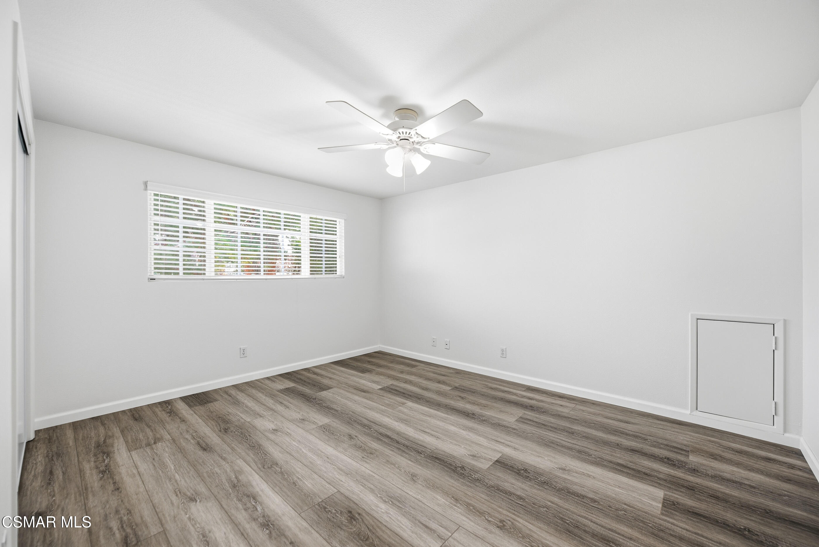 3598 Scofield Avenue Simi Valley, CA 93063 - Photo 55 of 86 wooden floor in an empty room with a window