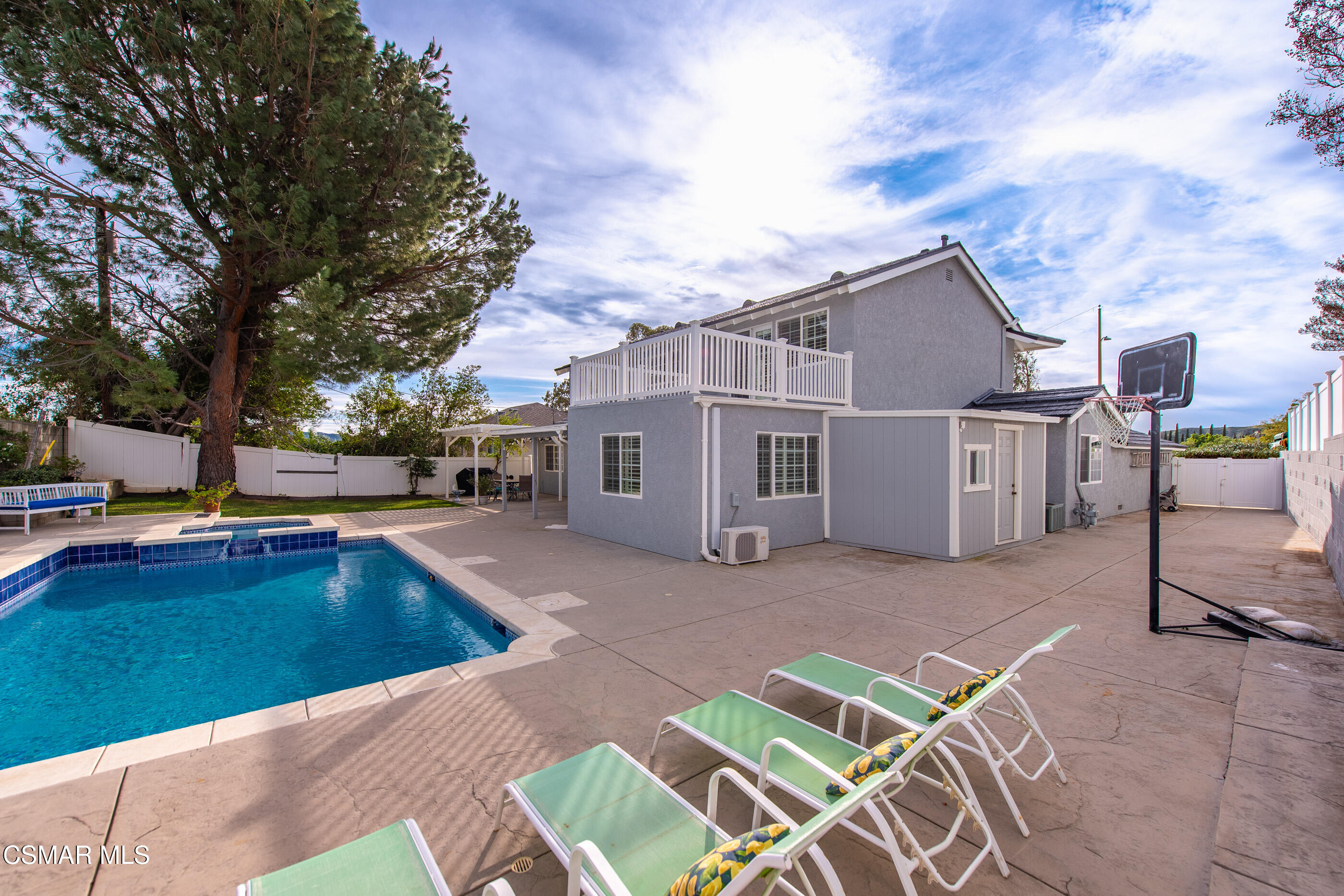 3598 Scofield Avenue Simi Valley, CA 93063 - Photo 69 of 86 a view of a house with pool and a yard