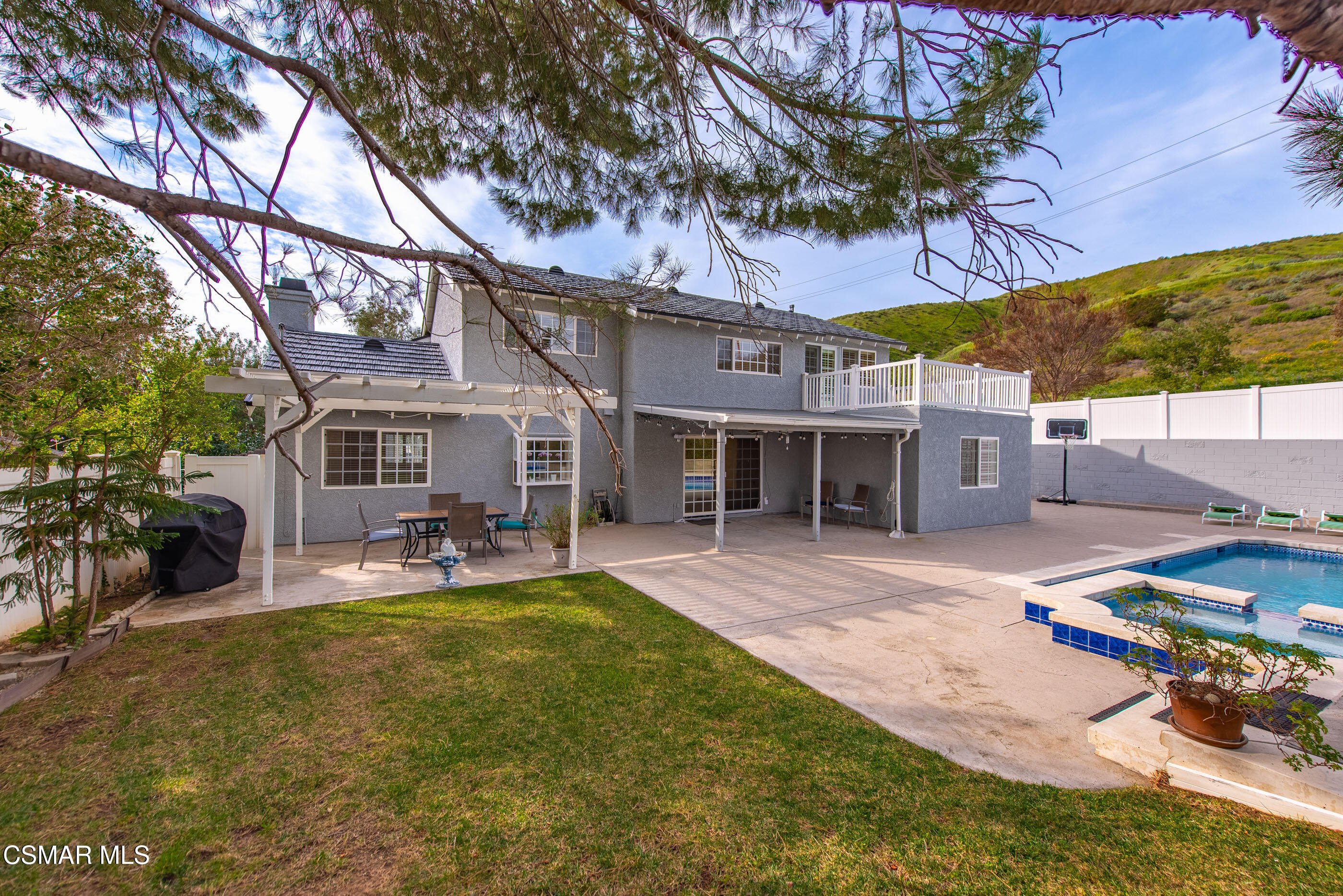 3598 Scofield Avenue Simi Valley, CA 93063 - Photo 70 of 86 a view of a house with swimming pool and sitting area