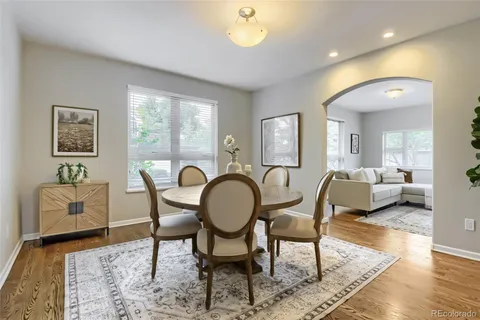 a view of a livingroom with furniture and a table