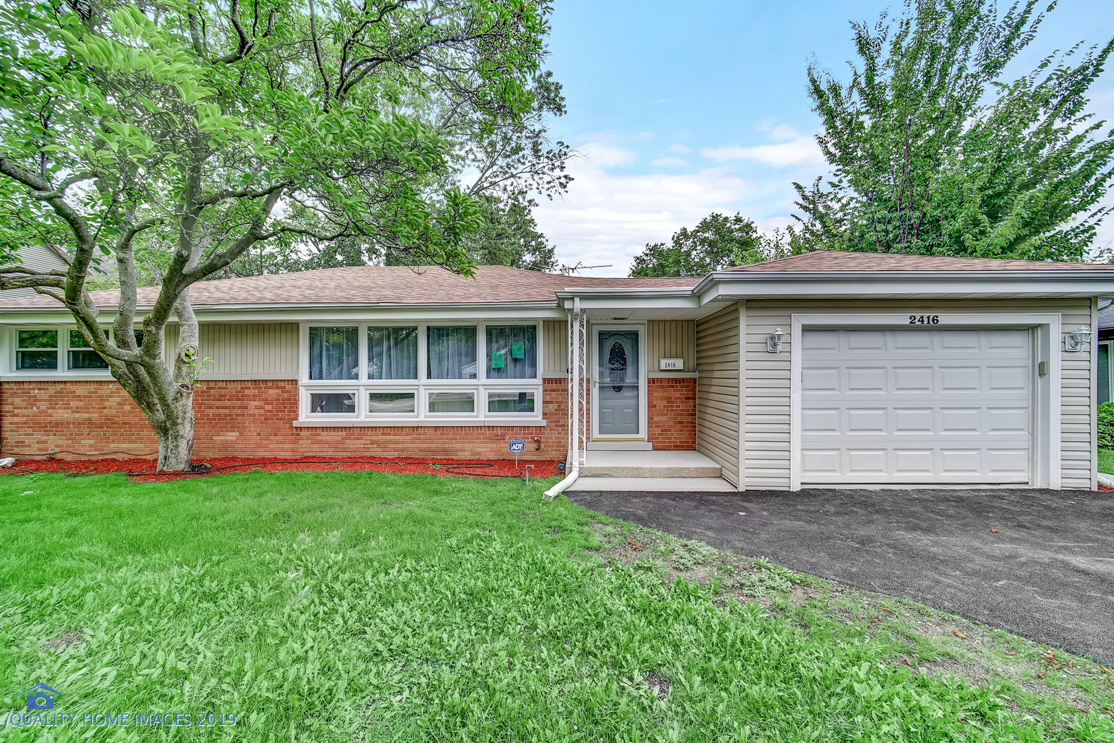 2416 Central Road Glenview, IL 60025 - Photo 1 of 17 a front view of house with yard and green space