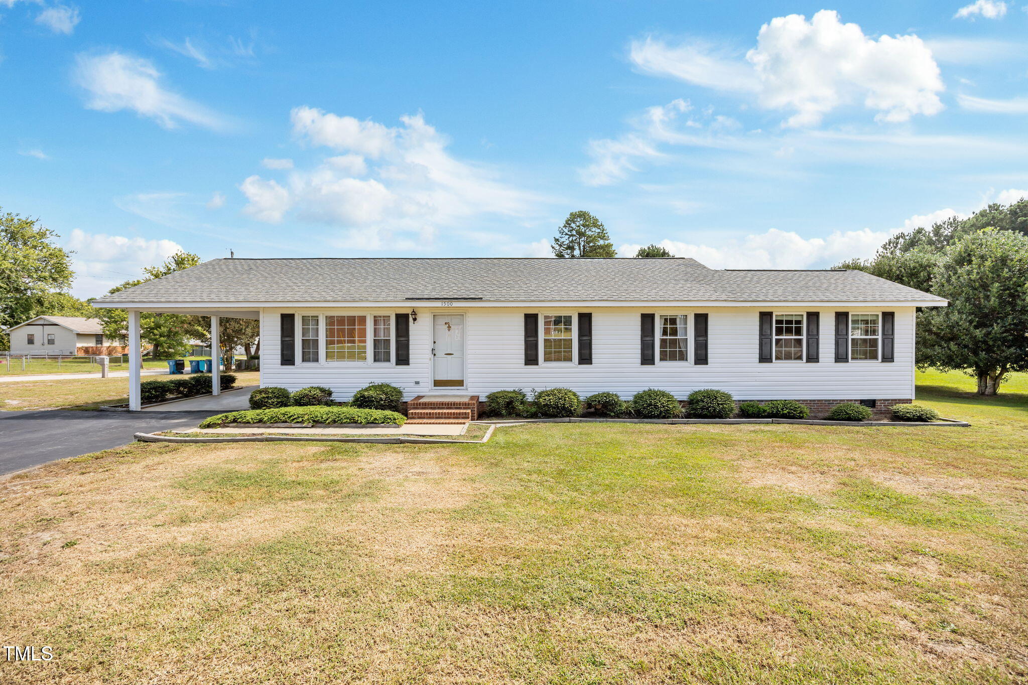 1500 Fairground Road Dunn, NC 28334 - Photo 1 of 31 a view of a house with swimming pool and a yard