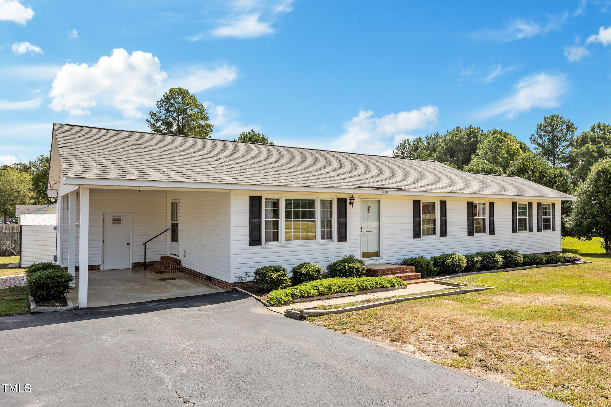 1500 Fairground Road Dunn, NC 28334 - Photo 26 of 31 a front view of a house with a yard