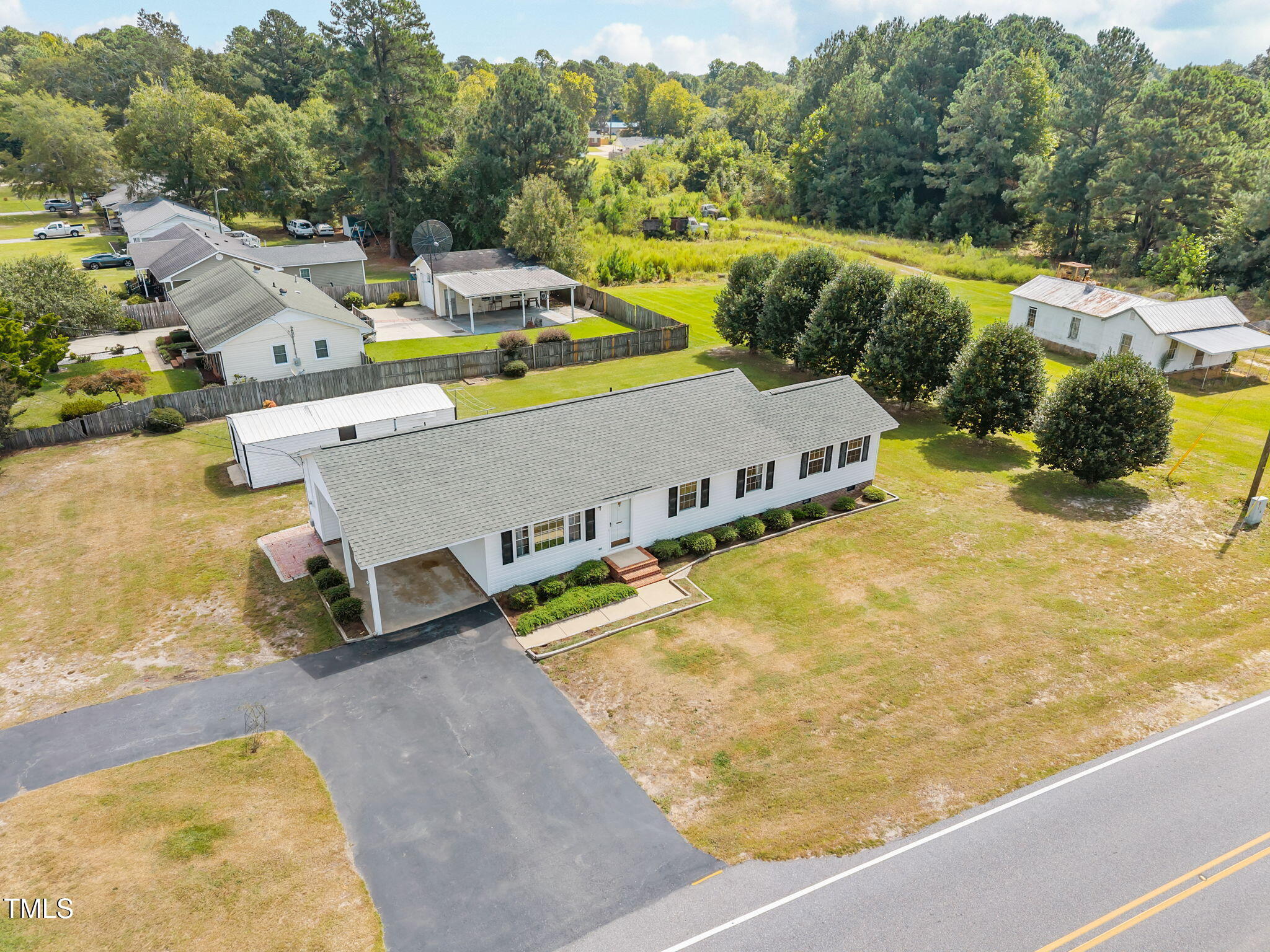1500 Fairground Road Dunn, NC 28334 - Photo 27 of 31 a view of a swimming pool with a patio