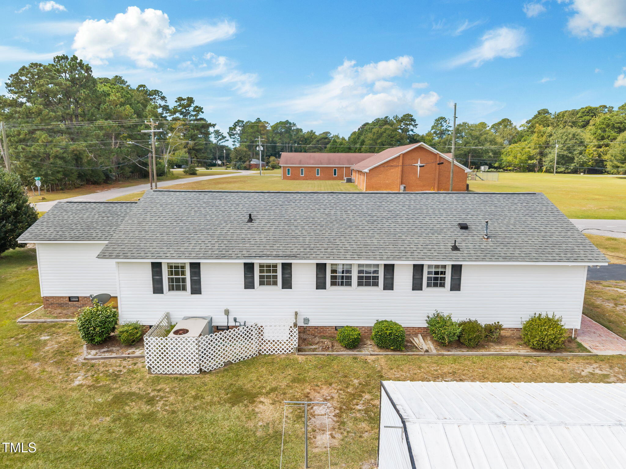1500 Fairground Road Dunn, NC 28334 - Photo 28 of 31 an aerial view of a house with a yard