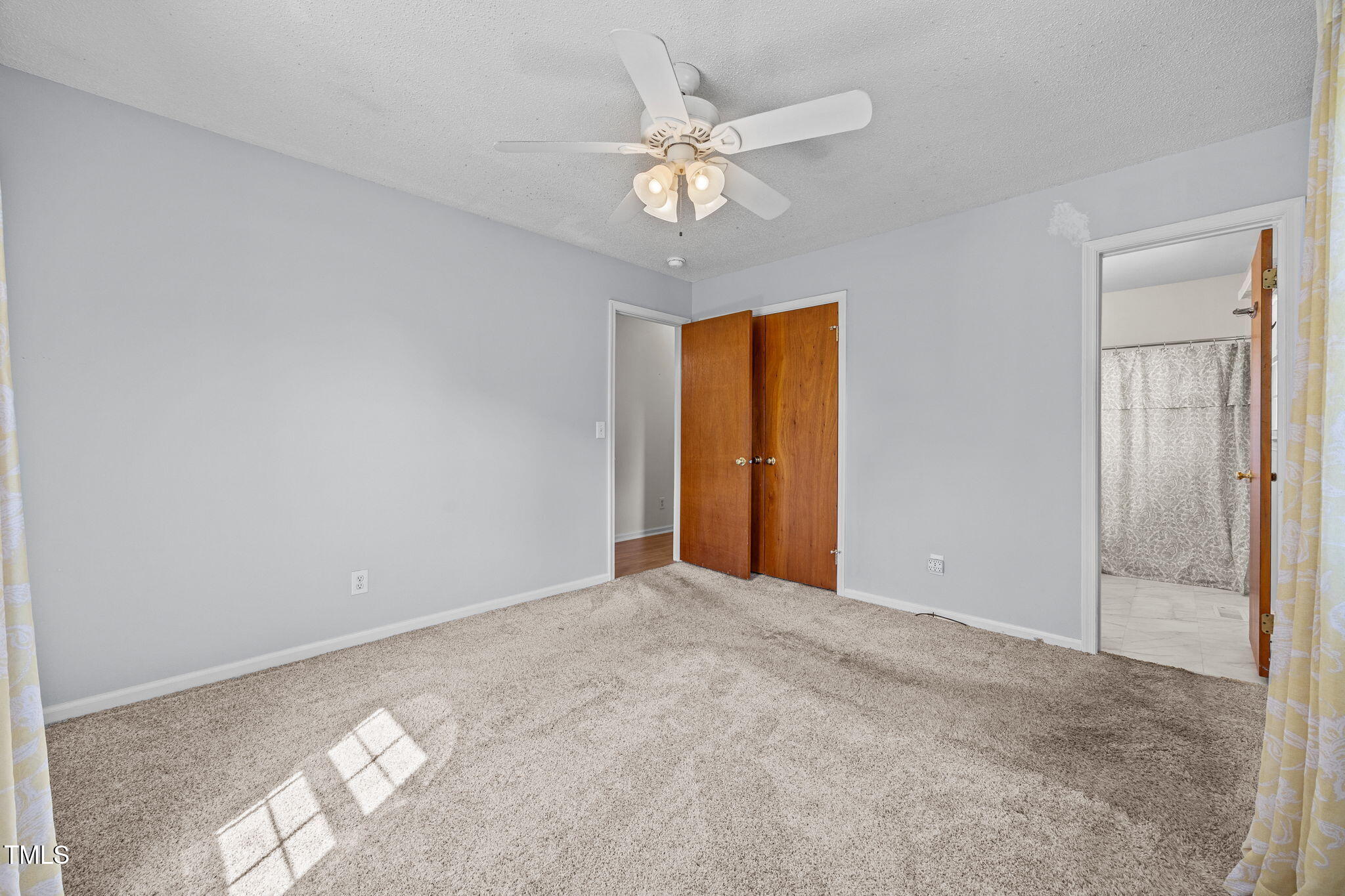 1500 Fairground Road Dunn, NC 28334 - Photo 10 of 31 a view of an empty room with a window