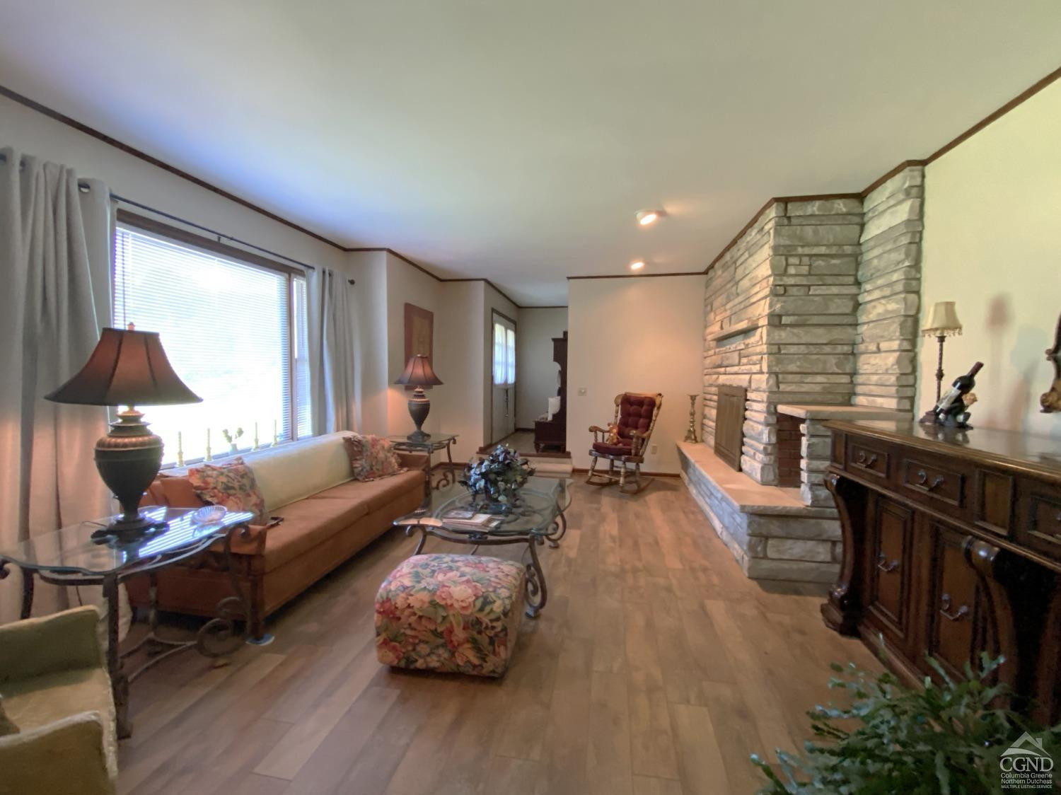 541 Church Road Hudson, NY 12534 - Photo 6 of 21 a living room with furniture and a wooden floor