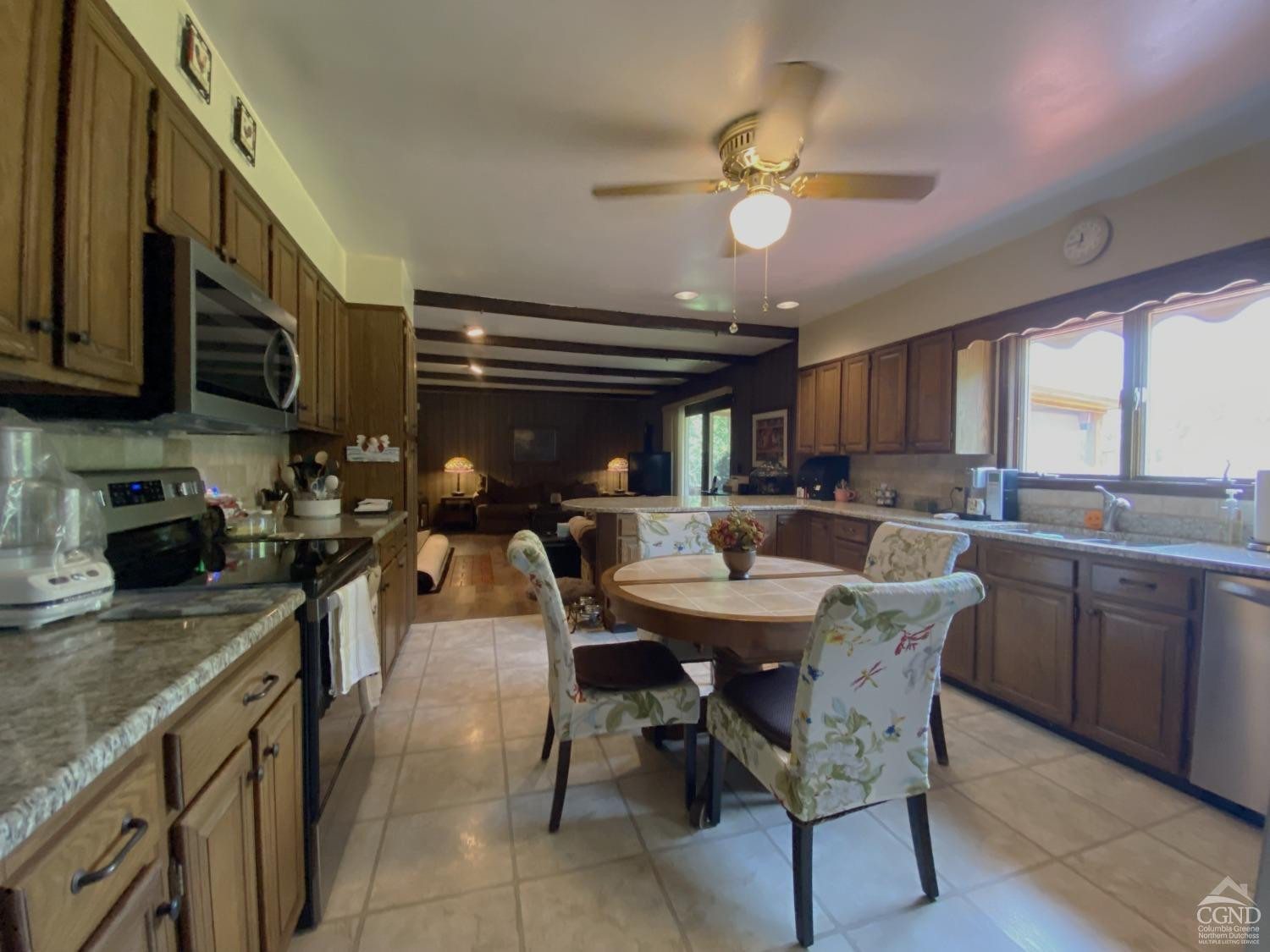 541 Church Road Hudson, NY 12534 - Photo 9 of 21 a kitchen with a dining table and chairs
