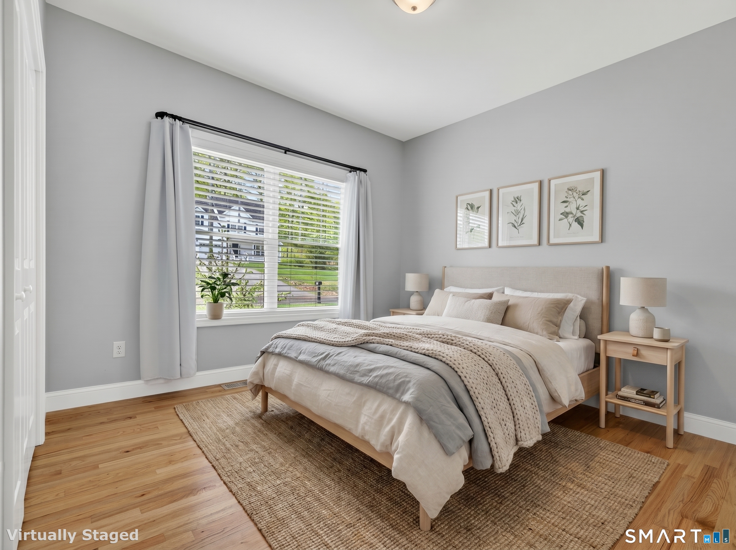 650 Ridgewood Road Middletown, CT 06457 - Photo 27 of 40 a spacious bedroom with a large bed and a window