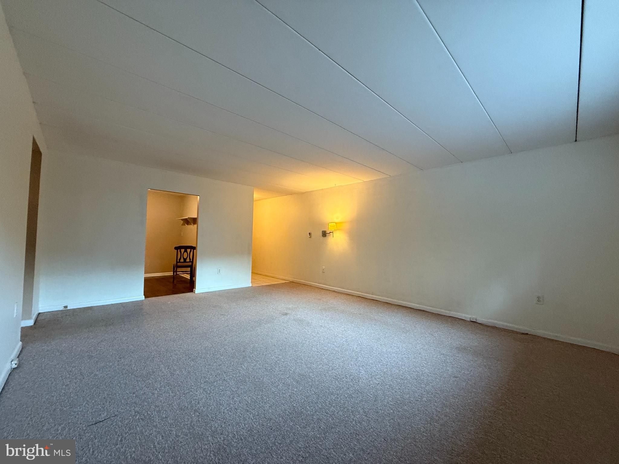 400 Glendale Road, Unit 23 Havertown, PA 19083 - Photo 4 of 12 a view of empty room with wooden floor