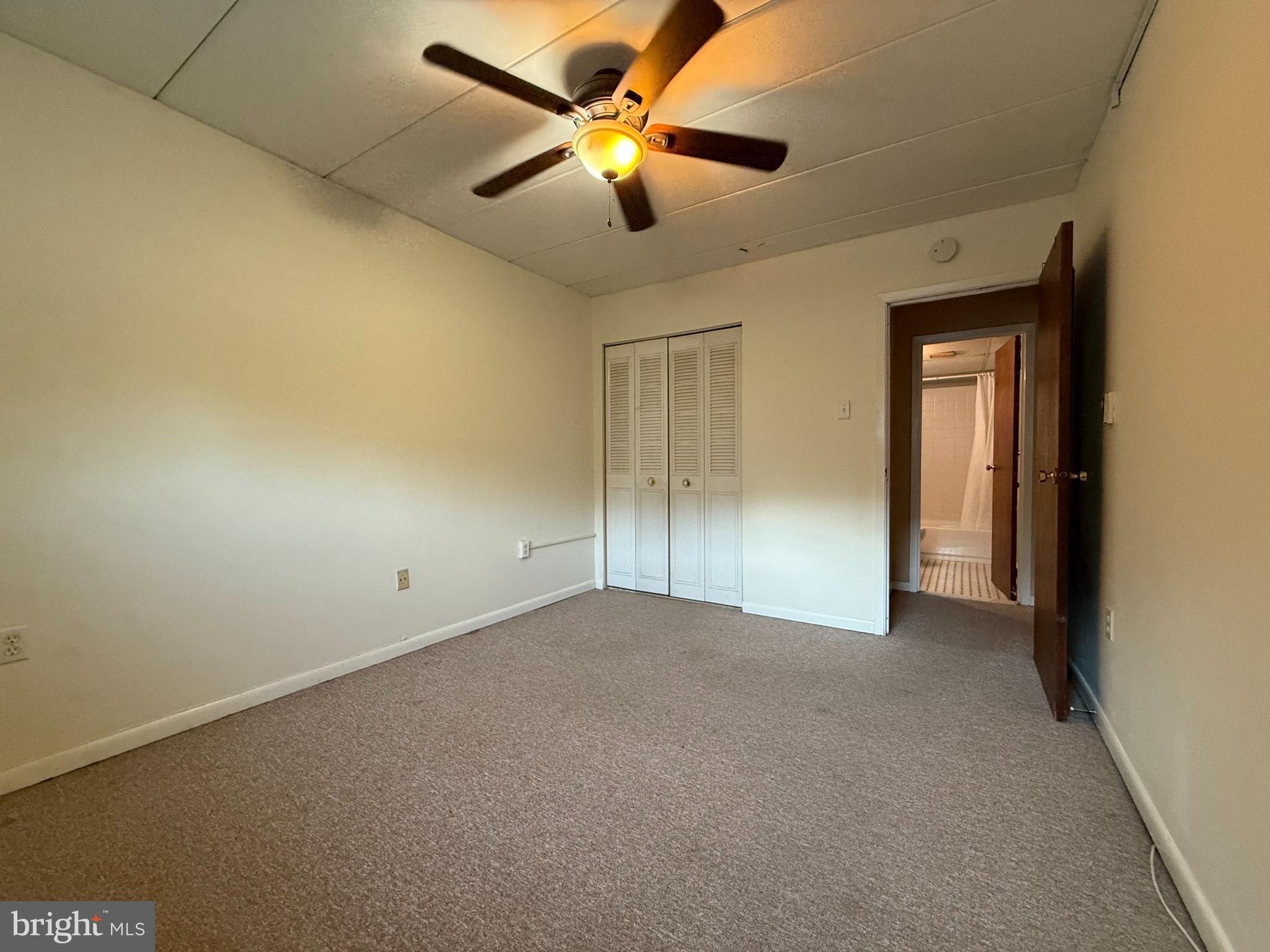 400 Glendale Road, Unit 23 Havertown, PA 19083 - Photo 10 of 12 a view of an empty room and a ceiling fan
