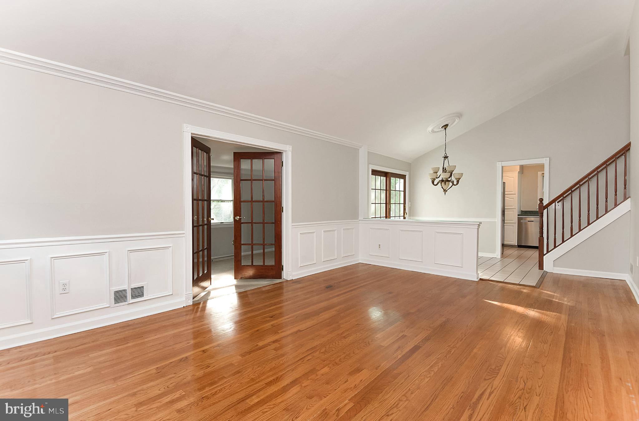15 Constance Drive Hamilton, NJ 08620 - Photo 4 of 29 a view of an empty room with wooden floor and a window