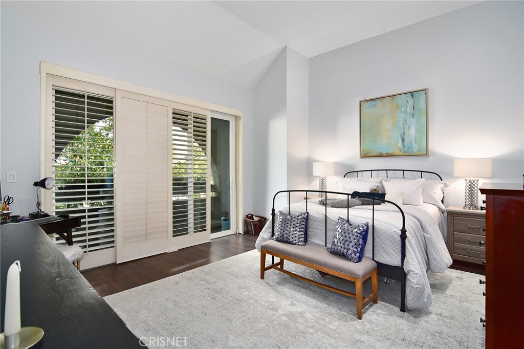 5305 White Oak Avenue, Unit E Encino, CA 91316 - Photo 11 of 26 a bedroom with a bed and a window