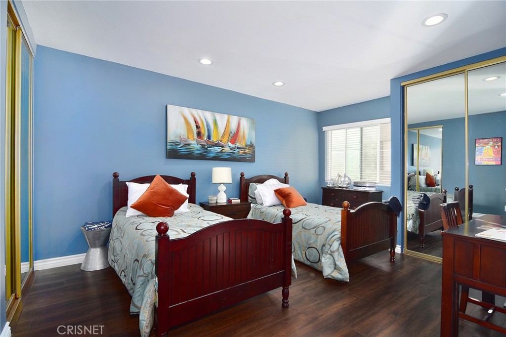 5305 White Oak Avenue, Unit E Encino, CA 91316 - Photo 16 of 26 a living room with furniture and a flat screen tv