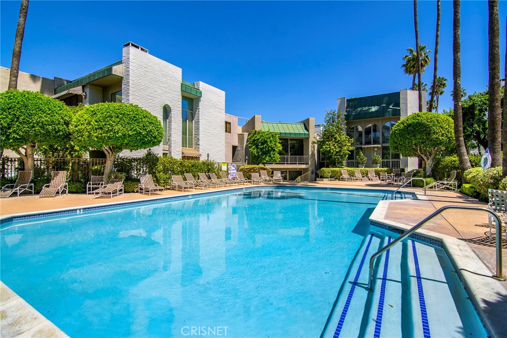 5305 White Oak Avenue, Unit E Encino, CA 91316 - Photo 20 of 26 a front view of a house with swimming pool having outdoor seating