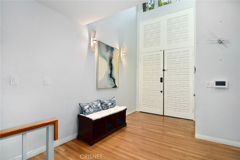 5305 White Oak Avenue, Unit E Encino, CA 91316 - Photo 2 of 26 a view of a room with wooden floor and cabinet