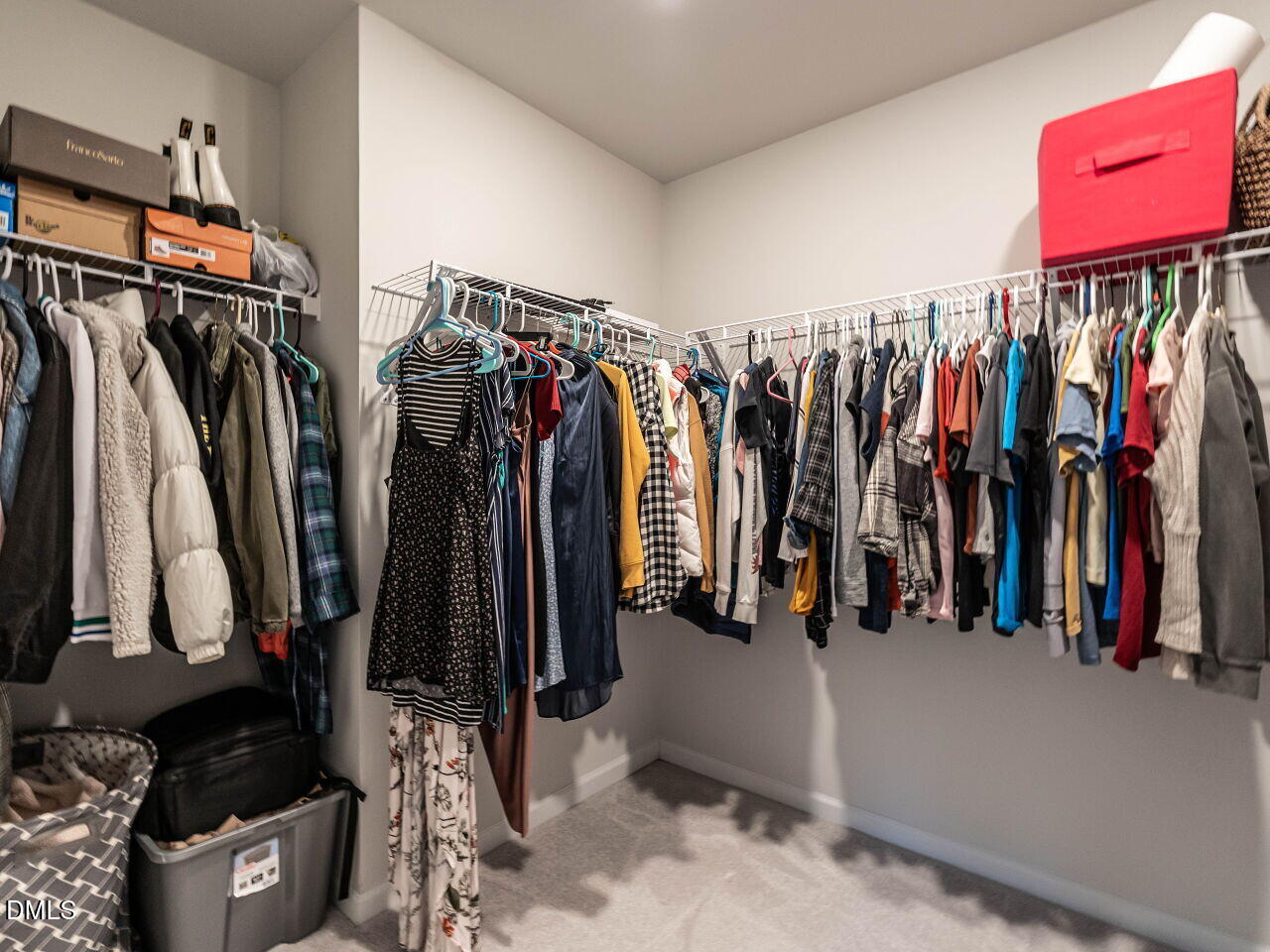 2456 Tonoloway Drive Raleigh, NC 27610 - Photo 27 of 45 a view of walk in closet with clothes and shoes
