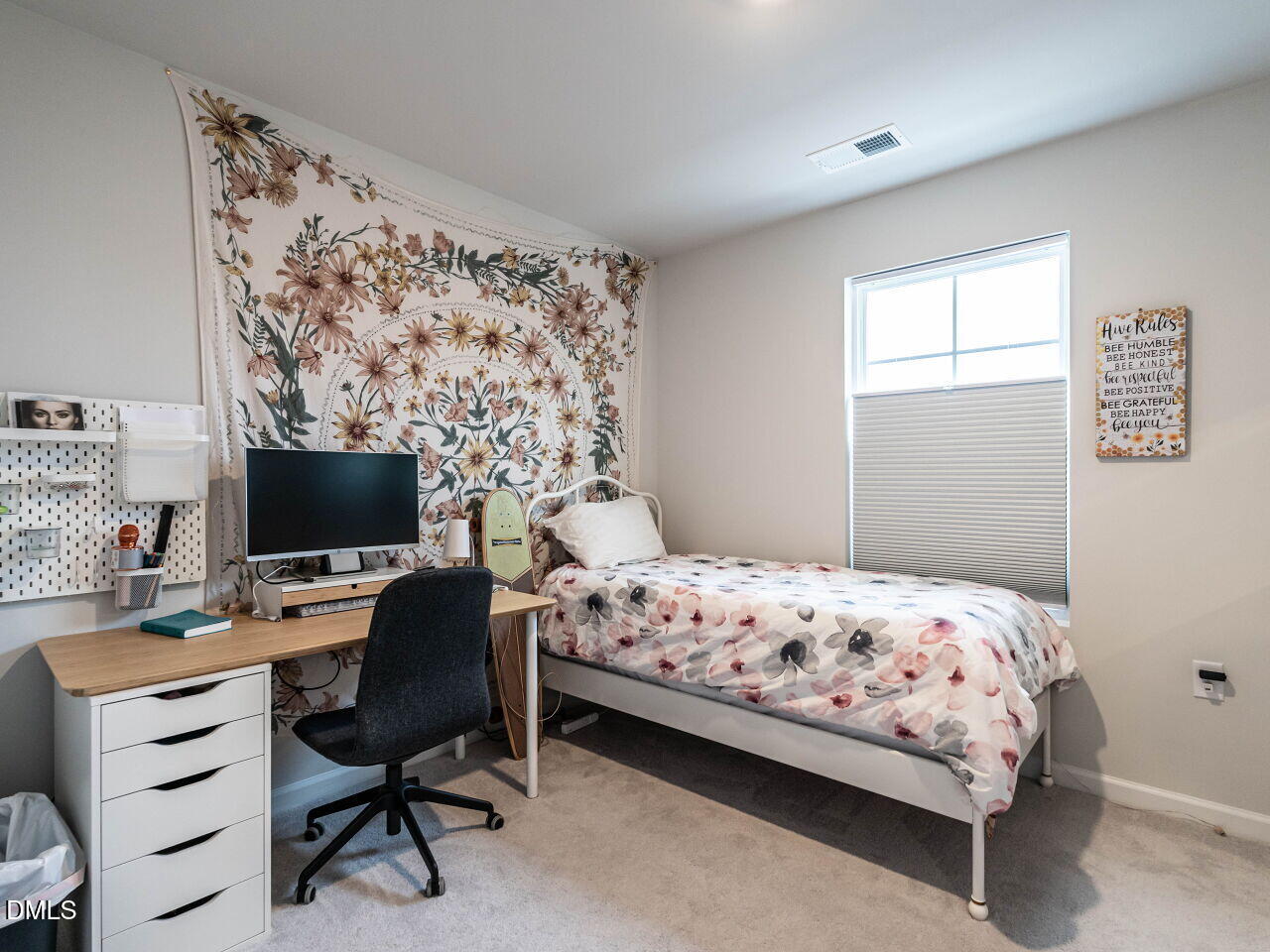 2456 Tonoloway Drive Raleigh, NC 27610 - Photo 28 of 45 a bedroom with a bed and a computer on a desk