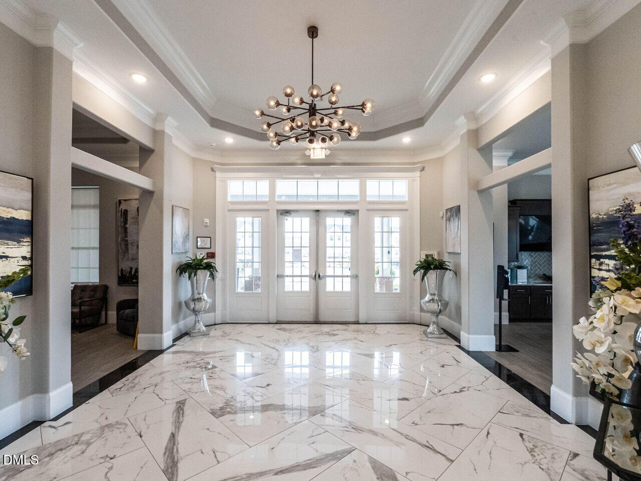 2456 Tonoloway Drive Raleigh, NC 27610 - Photo 34 of 45 a view of an entryway with a chandelier