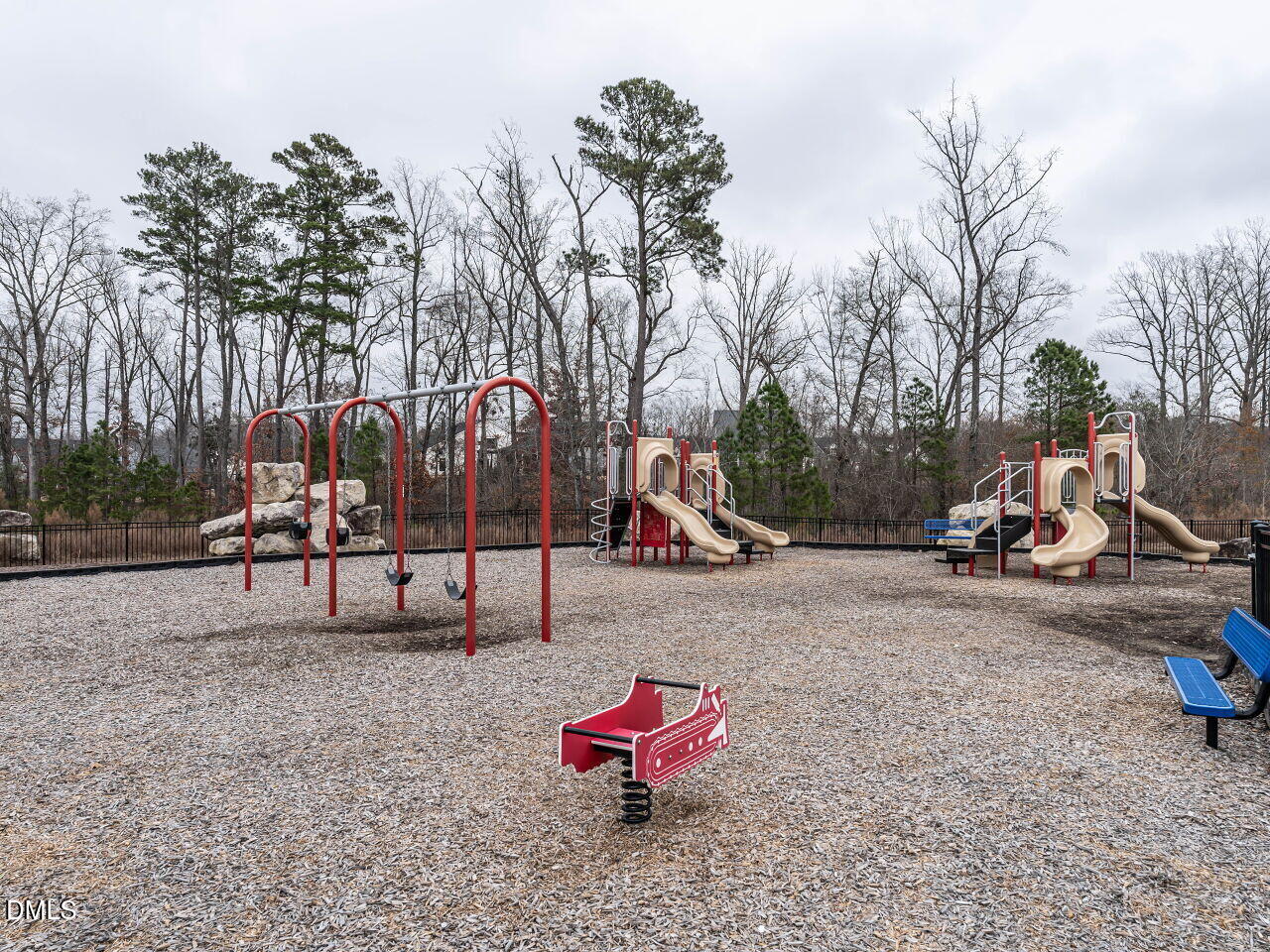 2456 Tonoloway Drive Raleigh, NC 27610 - Photo 44 of 45 a view of a park with swings
