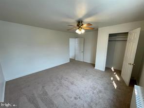 109 7th Street, Unit 3 Bridgeport, PA 19405 - Photo 8 of 11 wooden floor in an empty room with a window