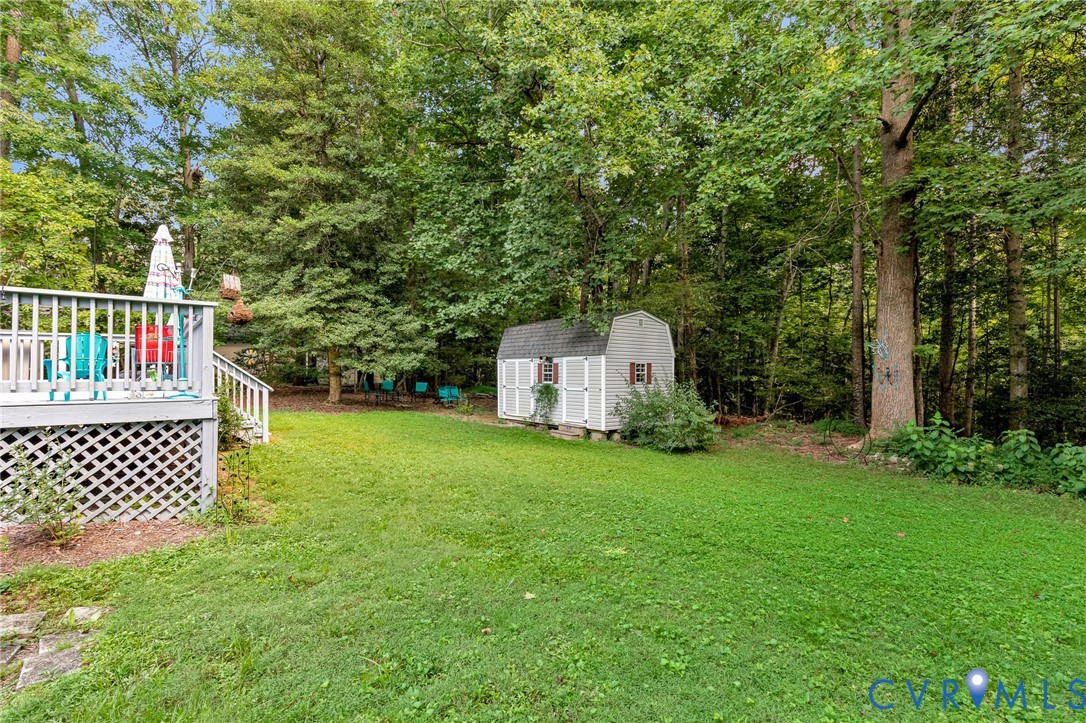 3841 Strawhill Road Richmond, VA 23231 - Photo 43 of 56 Expansive green lawn, multi-level wood deck with l
