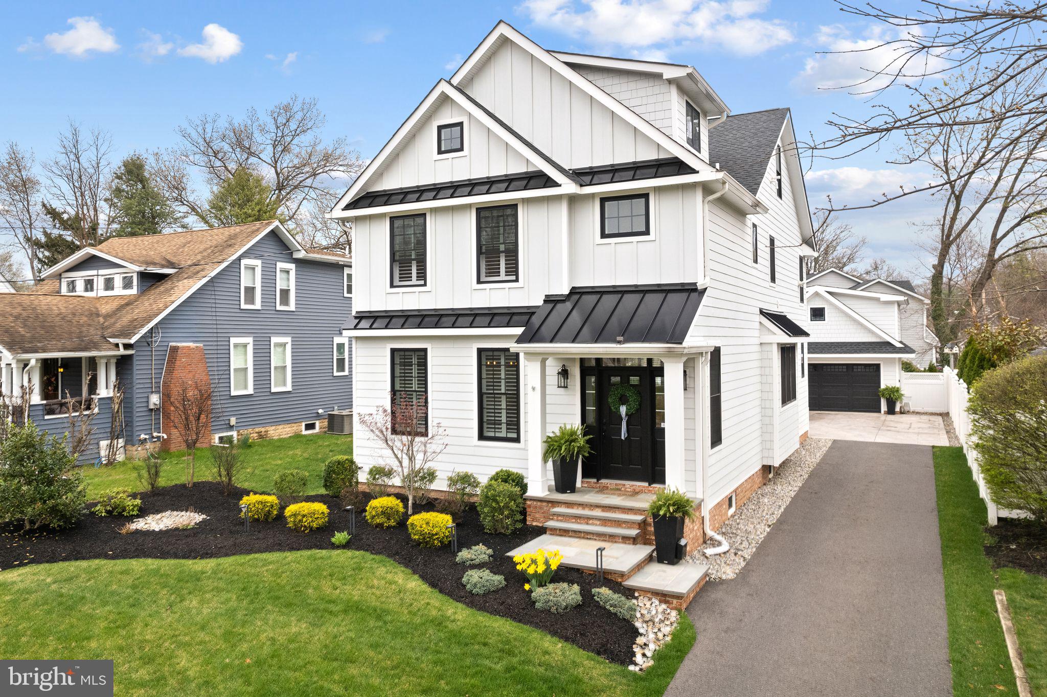 305 Grove Street Haddonfield, NJ 08033 - Photo 1 of 45 a front view of a house with garden