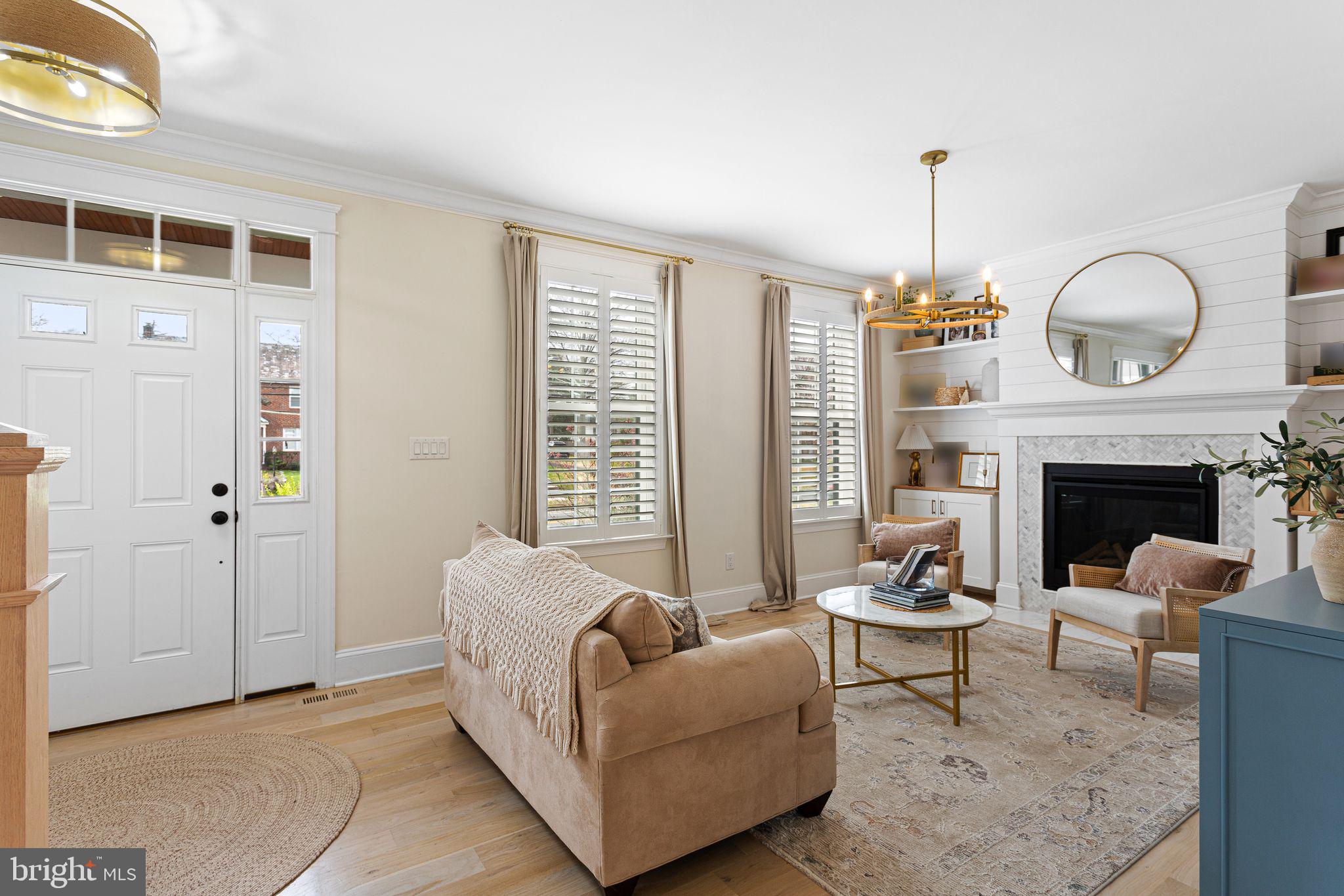 305 Grove Street Haddonfield, NJ 08033 - Photo 12 of 45 a living room with furniture and a fireplace
